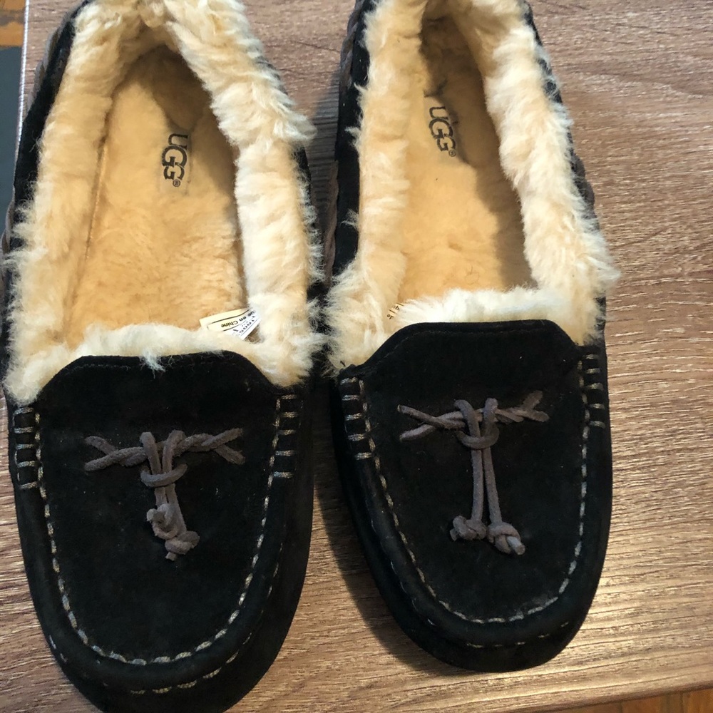 UGG moccasin style shoes.